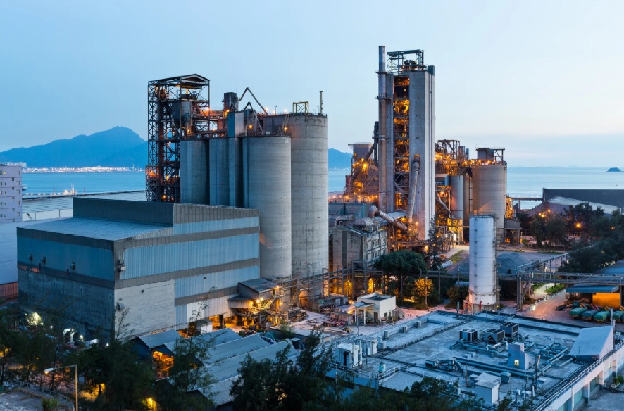 Large industrial processing plant at dusk