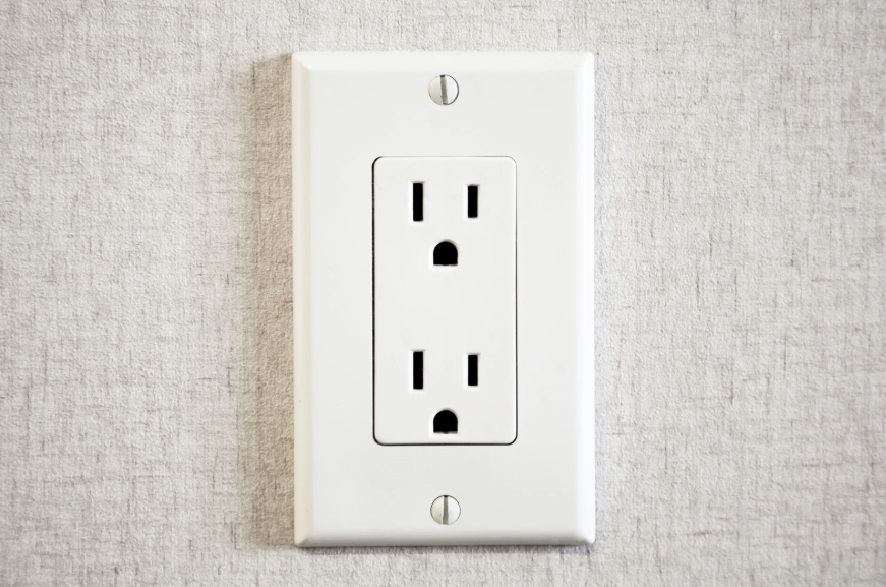 Electrical outlet mounted on a wall